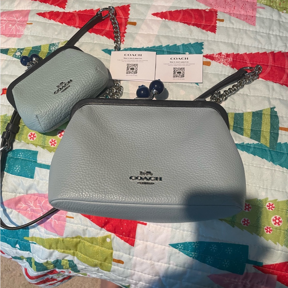 Coach blueberry crossbody with matching coin purse.